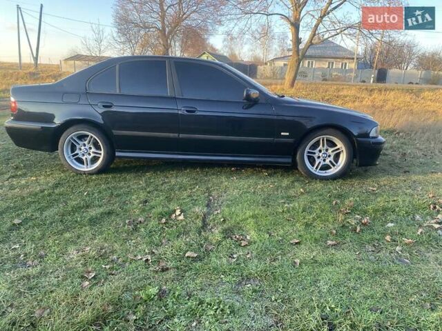 Черный БМВ 5 Серия, объемом двигателя 3 л и пробегом 530 тыс. км за 6000 $, фото 4 на Automoto.ua