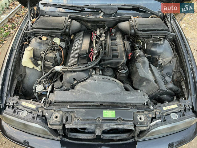 Черный БМВ 5 Серия, объемом двигателя 2.17 л и пробегом 455 тыс. км за 3999 $, фото 36 на Automoto.ua