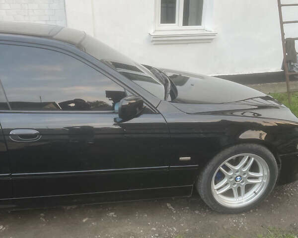 Черный БМВ 5 Серия, объемом двигателя 2.9 л и пробегом 530 тыс. км за 7500 $, фото 4 на Automoto.ua