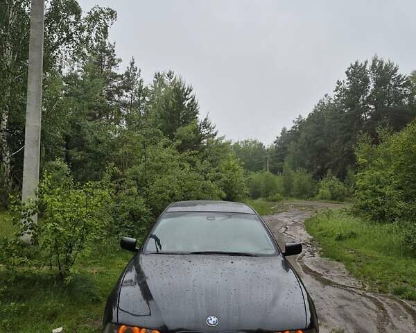Черный БМВ 5 Серия, объемом двигателя 2.5 л и пробегом 349 тыс. км за 5900 $, фото 3 на Automoto.ua