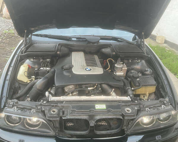 Черный БМВ 5 Серия, объемом двигателя 2.9 л и пробегом 530 тыс. км за 7500 $, фото 21 на Automoto.ua