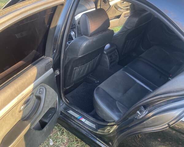 Черный БМВ 5 Серия, объемом двигателя 3 л и пробегом 530 тыс. км за 6000 $, фото 6 на Automoto.ua