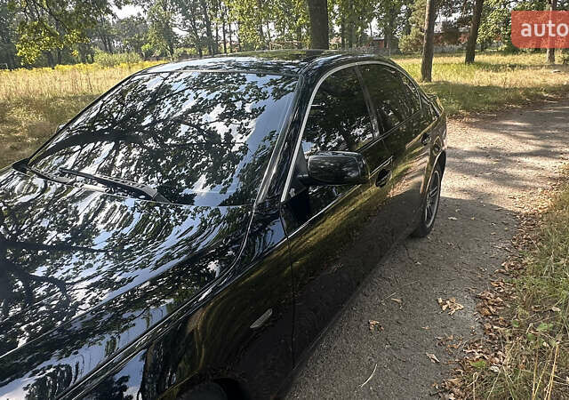 Черный БМВ 5 Серия, объемом двигателя 2.5 л и пробегом 280 тыс. км за 9700 $, фото 12 на Automoto.ua