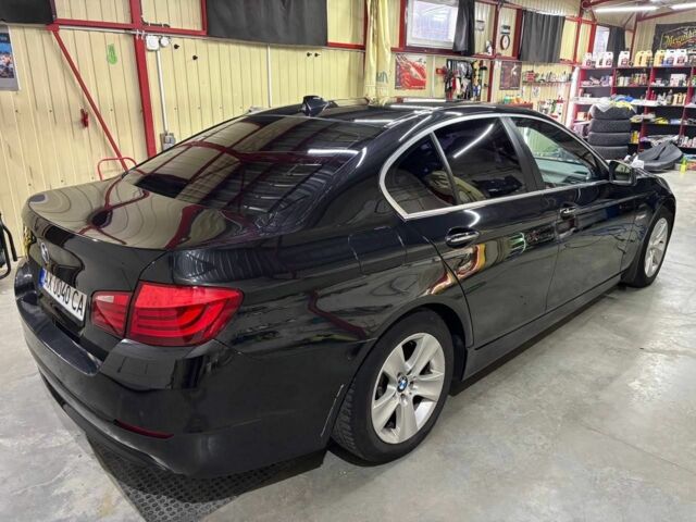 Черный БМВ 5 Серия, объемом двигателя 2.5 л и пробегом 158 тыс. км за 11300 $, фото 1 на Automoto.ua