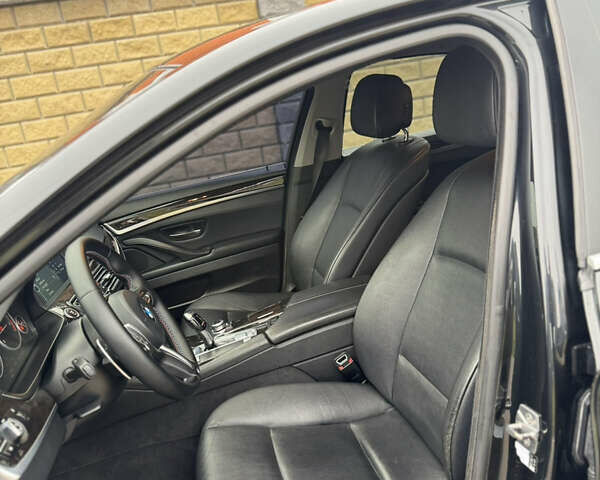 Черный БМВ 5 Серия, объемом двигателя 2 л и пробегом 308 тыс. км за 12999 $, фото 19 на Automoto.ua