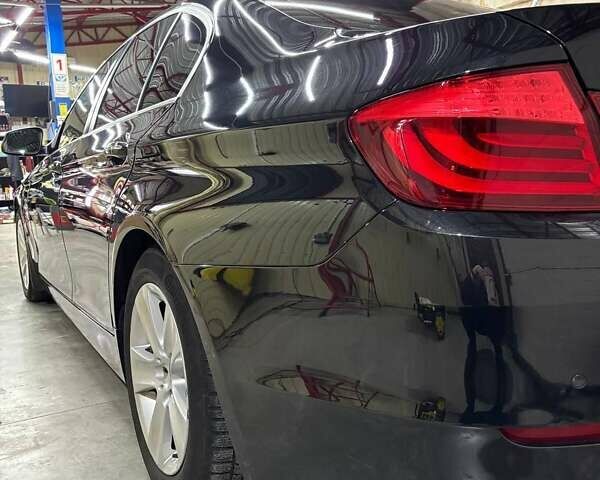 Черный БМВ 5 Серия, объемом двигателя 2.5 л и пробегом 158 тыс. км за 11300 $, фото 1 на Automoto.ua