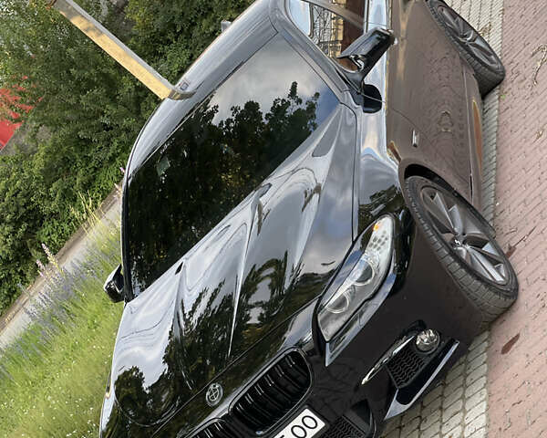 Чорний БМВ 5 Серія, об'ємом двигуна 2 л та пробігом 240 тис. км за 15350 $, фото 13 на Automoto.ua
