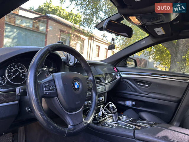 Черный БМВ 5 Серия, объемом двигателя 2 л и пробегом 160 тыс. км за 12100 $, фото 4 на Automoto.ua