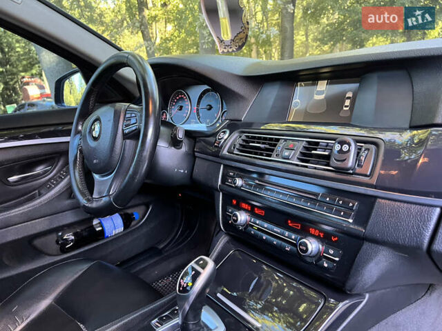 Черный БМВ 5 Серия, объемом двигателя 2 л и пробегом 322 тыс. км за 14799 $, фото 39 на Automoto.ua