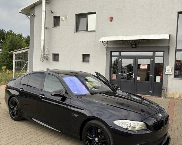 Черный БМВ 5 Серия, объемом двигателя 2.98 л и пробегом 138 тыс. км за 19335 $, фото 1 на Automoto.ua
