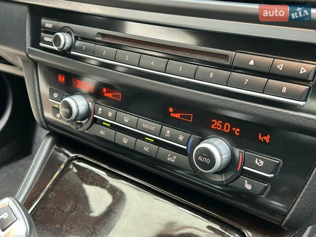 Чорний БМВ 5 Серія, об'ємом двигуна 2 л та пробігом 186 тис. км за 12999 $, фото 26 на Automoto.ua