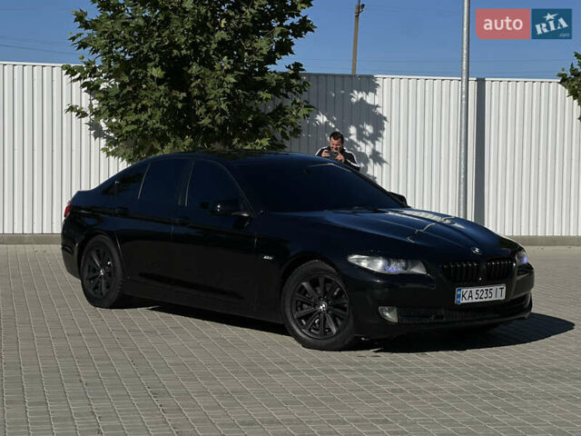Черный БМВ 5 Серия, объемом двигателя 2 л и пробегом 322 тыс. км за 14799 $, фото 1 на Automoto.ua