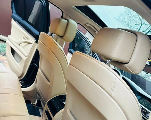 Чорний БМВ 5 Серія, об'ємом двигуна 2 л та пробігом 184 тис. км за 12400 $, фото 6 на Automoto.ua