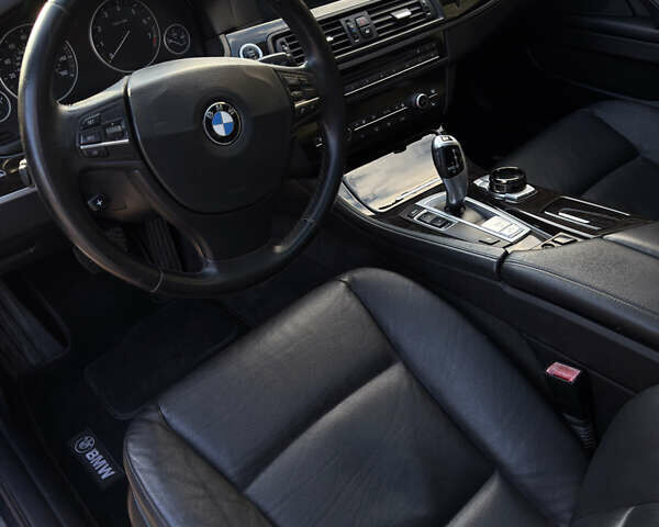 Черный БМВ 5 Серия, объемом двигателя 2 л и пробегом 202 тыс. км за 11799 $, фото 7 на Automoto.ua