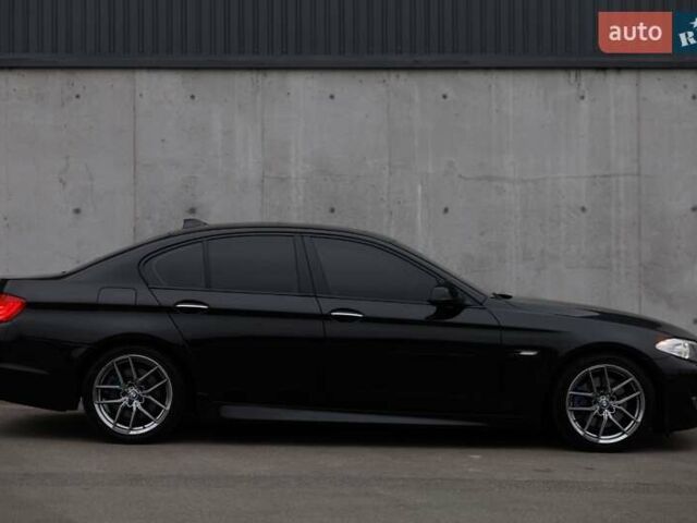 Черный БМВ 5 Серия, объемом двигателя 2 л и пробегом 172 тыс. км за 13500 $, фото 1 на Automoto.ua