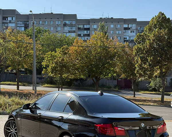 Черный БМВ 5 Серия, объемом двигателя 2.99 л и пробегом 99 тыс. км за 18000 $, фото 2 на Automoto.ua