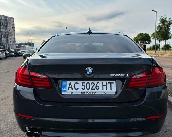 Черный БМВ 5 Серия, объемом двигателя 2 л и пробегом 270 тыс. км за 11800 $, фото 1 на Automoto.ua