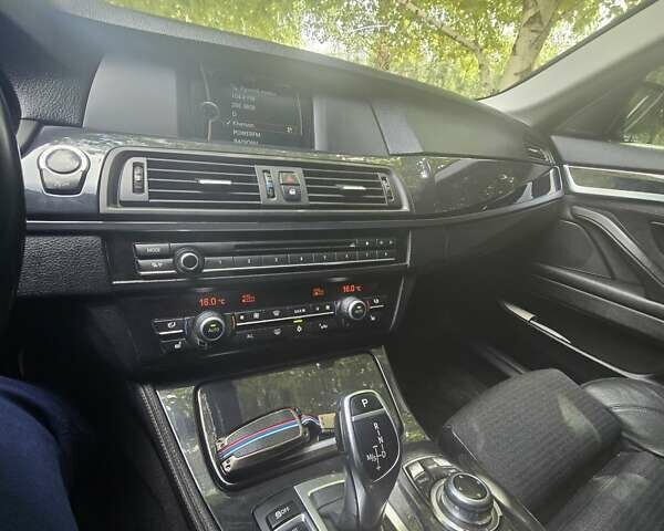 Черный БМВ 5 Серия, объемом двигателя 2 л и пробегом 208 тыс. км за 19000 $, фото 5 на Automoto.ua