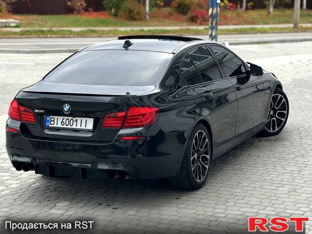 Чорний БМВ 5 Серія, об'ємом двигуна 2 л та пробігом 207 тис. км за 12400 $, фото 4 на Automoto.ua