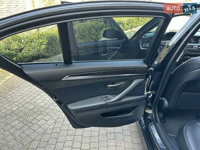 Чорний БМВ 5 Серія, об'ємом двигуна 2 л та пробігом 220 тис. км за 19750 $, фото 14 на Automoto.ua