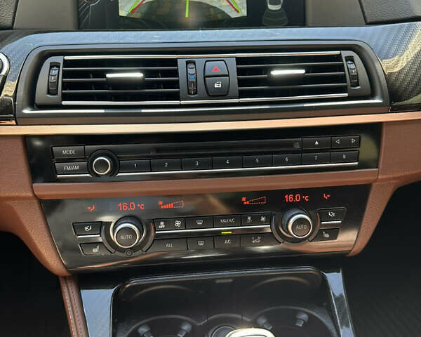 Черный БМВ 5 Серия, объемом двигателя 2 л и пробегом 178 тыс. км за 16850 $, фото 19 на Automoto.ua