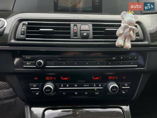 Чорний БМВ 5 Серія, об'ємом двигуна 2 л та пробігом 240 тис. км за 12799 $, фото 27 на Automoto.ua