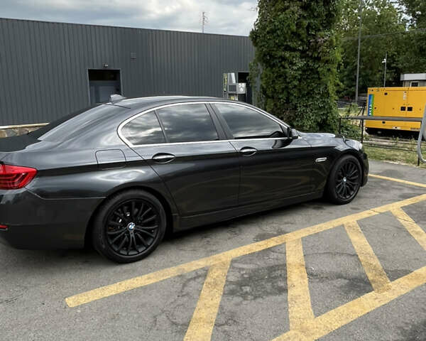 Черный БМВ 5 Серия, объемом двигателя 2 л и пробегом 225 тыс. км за 14000 $, фото 3 на Automoto.ua