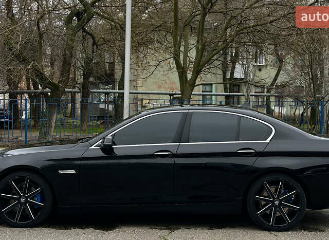 Черный БМВ 5 Серия, объемом двигателя 2 л и пробегом 150 тыс. км за 16499 $, фото 1 на Automoto.ua