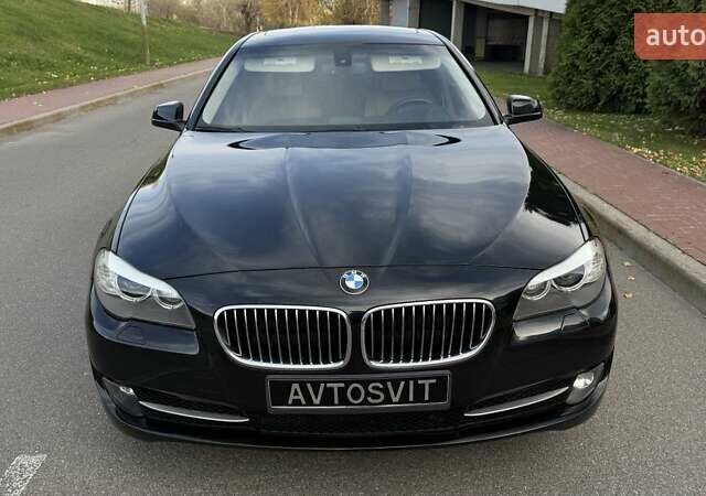 Черный БМВ 5 Серия, объемом двигателя 2 л и пробегом 170 тыс. км за 12650 $, фото 1 на Automoto.ua
