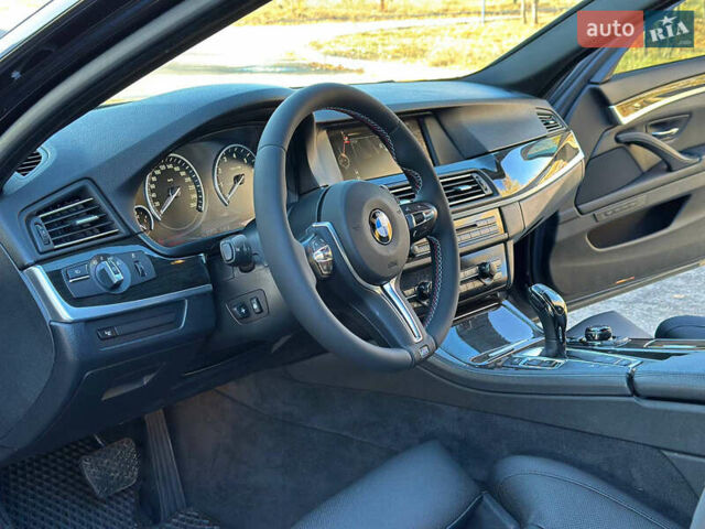 Черный БМВ 5 Серия, объемом двигателя 4.4 л и пробегом 115 тыс. км за 17900 $, фото 5 на Automoto.ua