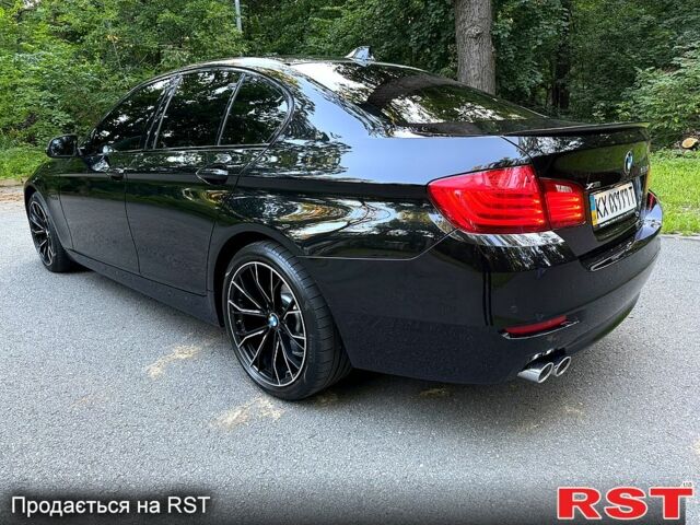 Черный БМВ 5 Серия, объемом двигателя 3 л и пробегом 200 тыс. км за 23700 $, фото 1 на Automoto.ua