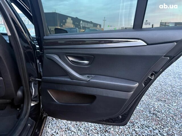 Черный БМВ 5 Серия, объемом двигателя 2 л и пробегом 260 тыс. км за 13640 $, фото 27 на Automoto.ua