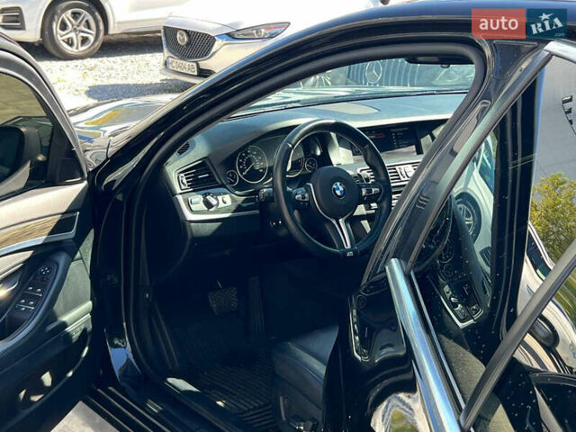 Чорний БМВ 5 Серія, об'ємом двигуна 2 л та пробігом 215 тис. км за 13500 $, фото 1 на Automoto.ua