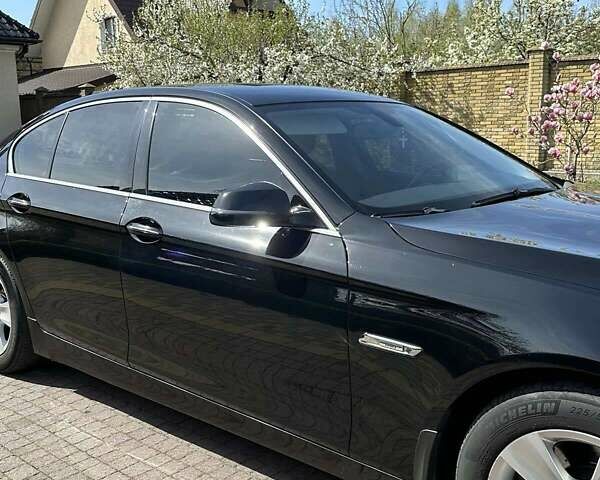 Чорний БМВ 5 Серія, об'ємом двигуна 2 л та пробігом 220 тис. км за 19750 $, фото 1 на Automoto.ua
