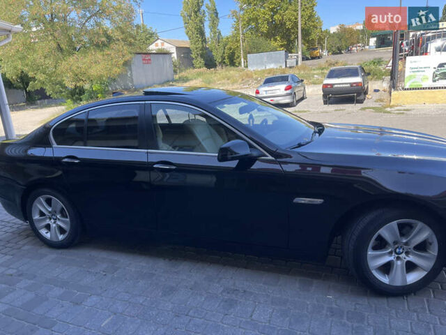 Черный БМВ 5 Серия, объемом двигателя 2 л и пробегом 210 тыс. км за 13400 $, фото 2 на Automoto.ua