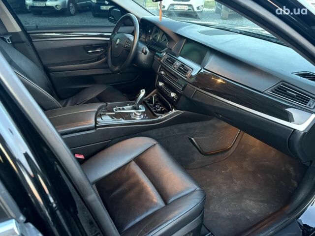 Черный БМВ 5 Серия, объемом двигателя 2 л и пробегом 260 тыс. км за 13640 $, фото 21 на Automoto.ua