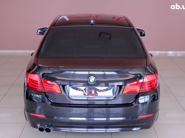 Черный БМВ 5 Серия, объемом двигателя 2 л и пробегом 187 тыс. км за 11900 $, фото 4 на Automoto.ua
