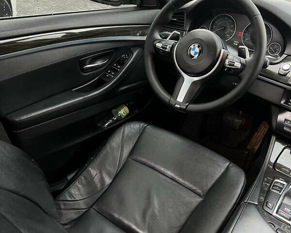 Черный БМВ 5 Серия, объемом двигателя 2 л и пробегом 170 тыс. км за 12800 $, фото 5 на Automoto.ua