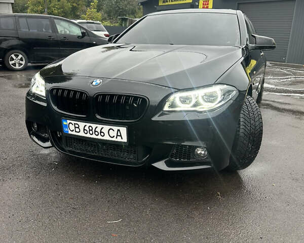 Черный БМВ 5 Серия, объемом двигателя 2 л и пробегом 199 тыс. км за 13999 $, фото 1 на Automoto.ua