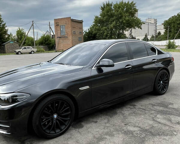 Черный БМВ 5 Серия, объемом двигателя 2 л и пробегом 225 тыс. км за 14000 $, фото 1 на Automoto.ua