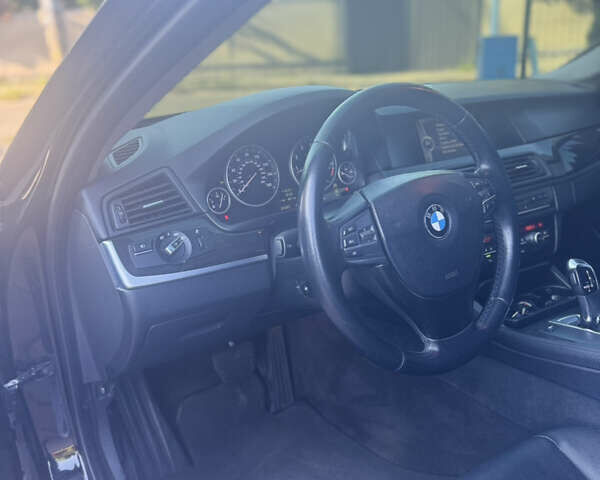 Черный БМВ 5 Серия, объемом двигателя 3 л и пробегом 296 тыс. км за 12300 $, фото 6 на Automoto.ua