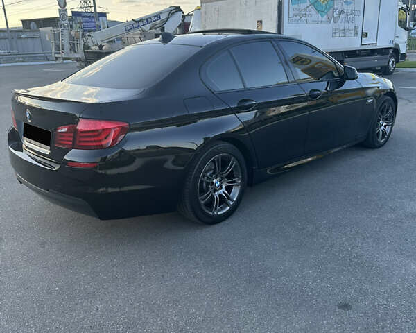 Черный БМВ 5 Серия, объемом двигателя 2 л и пробегом 178 тыс. км за 16850 $, фото 5 на Automoto.ua