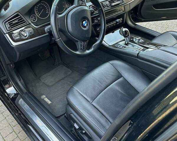 Чорний БМВ 5 Серія, об'ємом двигуна 2 л та пробігом 220 тис. км за 19750 $, фото 5 на Automoto.ua