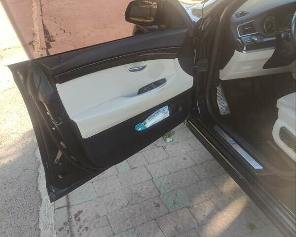 Черный БМВ 5 Серия, объемом двигателя 2 л и пробегом 165 тыс. км за 21300 $, фото 18 на Automoto.ua