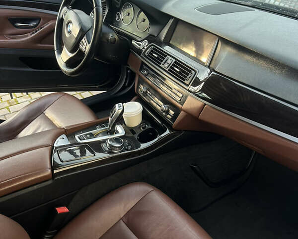 Черный БМВ 5 Серия, объемом двигателя 2 л и пробегом 215 тыс. км за 9499 $, фото 4 на Automoto.ua