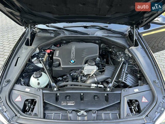 Чорний БМВ 5 Серія, об'ємом двигуна 2 л та пробігом 176 тис. км за 13700 $, фото 19 на Automoto.ua