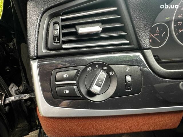 Чорний БМВ 5 Серія, об'ємом двигуна 2 л та пробігом 331 тис. км за 19490 $, фото 11 на Automoto.ua