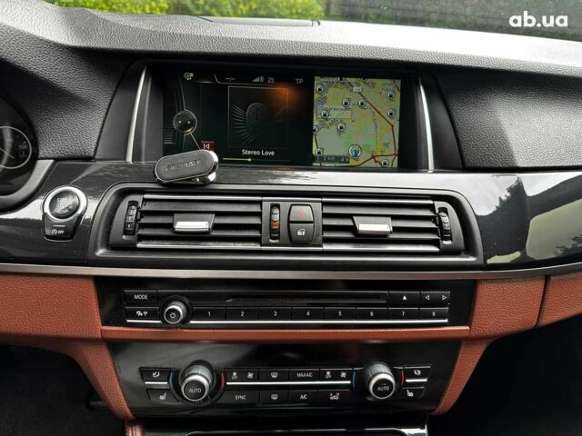 Чорний БМВ 5 Серія, об'ємом двигуна 2 л та пробігом 331 тис. км за 19490 $, фото 13 на Automoto.ua