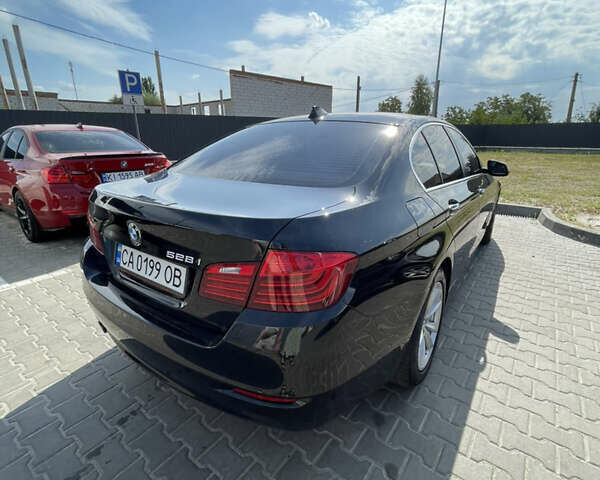 Черный БМВ 5 Серия, объемом двигателя 2 л и пробегом 180 тыс. км за 14000 $, фото 1 на Automoto.ua