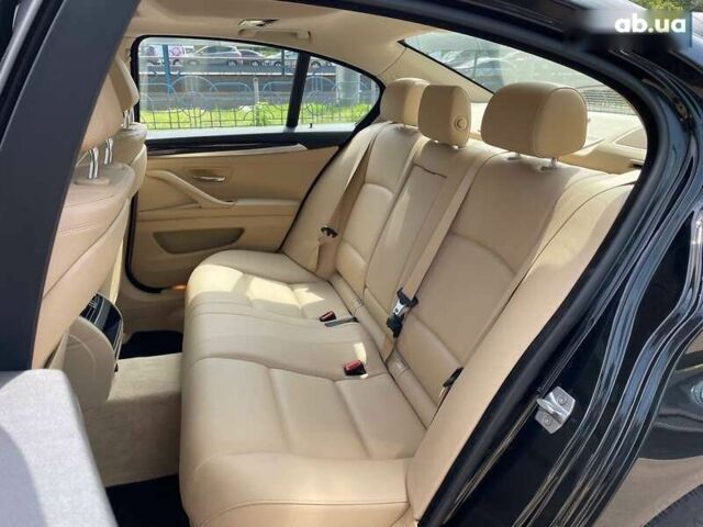 Черный БМВ 5 Серия, объемом двигателя 2 л и пробегом 117 тыс. км за 17899 $, фото 18 на Automoto.ua